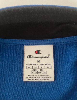 Tuta bimbo Champion blu e nera