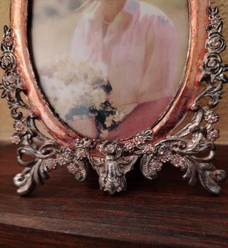 Portafoto ovale vintage con perline