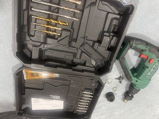 Taladro percutor Parkside + maletín