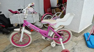 Bicicleta niña aprendizaje rosa