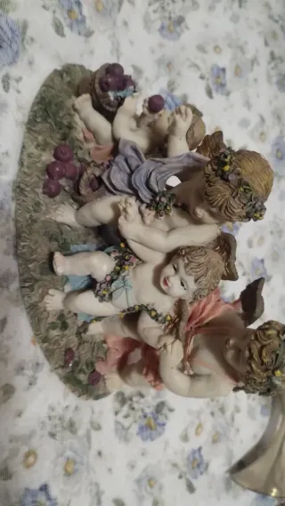 Statua antichi angeli raccoglitori 1980