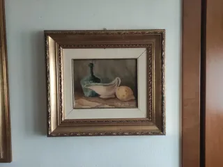 Quadro natura morta con limone e bottiglia