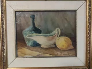 Quadro natura morta con limone e bottiglia