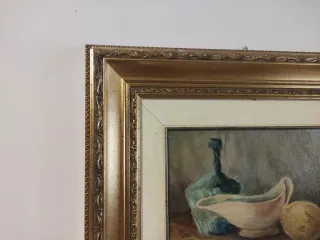 Quadro natura morta con limone e bottiglia