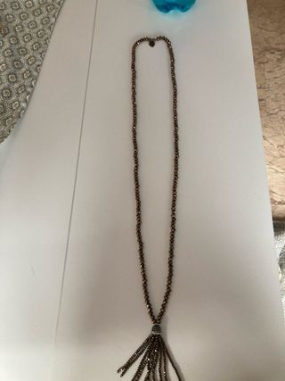 Collana con perline bronzo e nappa