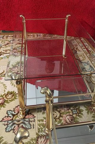 Mesas auxiliares cristal y metal dorado