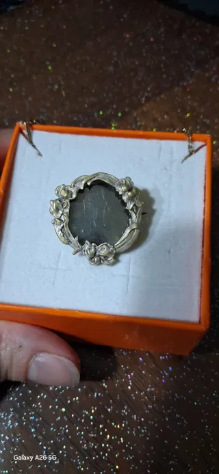 Spilla a cornice in argento