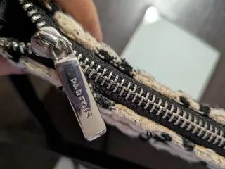 Bolso cruzado Parfois beige y negro