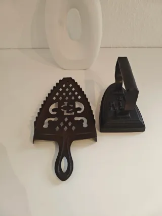 Plancha antigua de hierro fundido