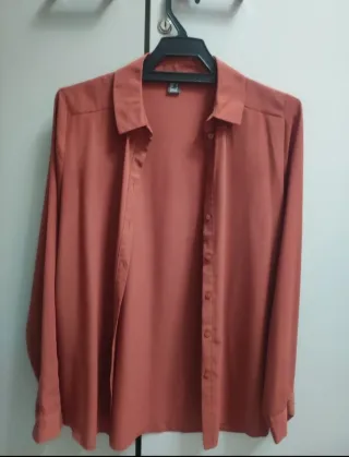 Camisa naranja manga larga