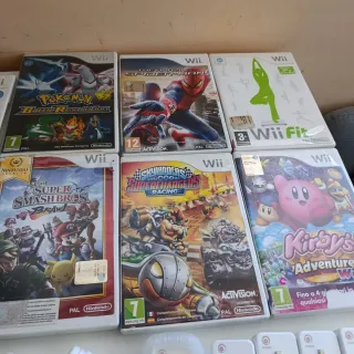 Nintendo Wii 5 Wiimote giochi Pokémon Mario kirby