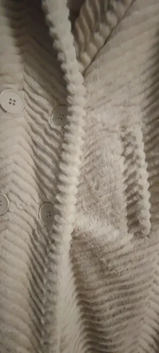 Chaleco pelito crema