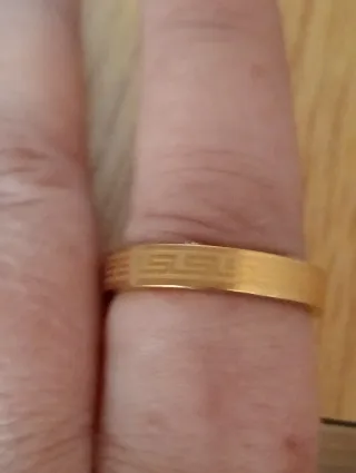 Alianza de acero chapada en oro