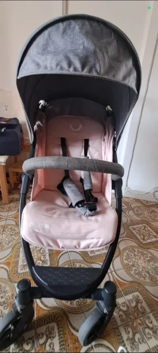 Cochecito bebé gris y rosa