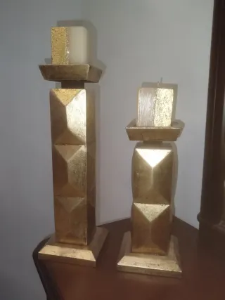 Candelabri in legno dorati