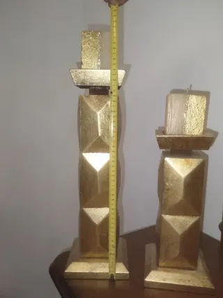 Candelabri in legno dorati