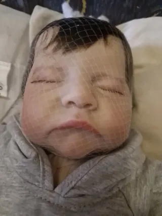 Bebé Reborn con accesorios