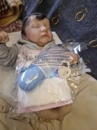 Bebé Reborn con accesorios