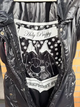 Chaleco plumífero mujer semilargo.