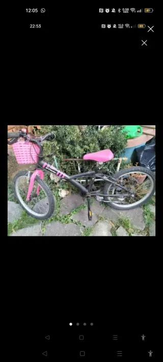 Bici Btwin rosa con cesta come foto