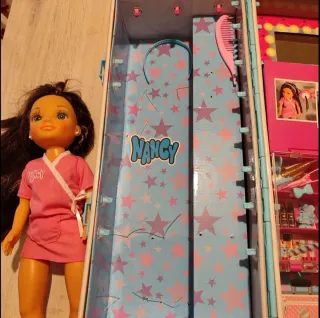 Nancy Peluquera con Peluquería.