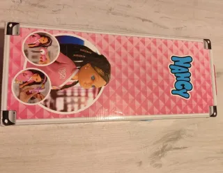 Nancy Peluquera con Peluquería.