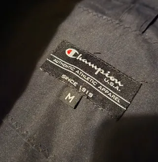 Piumino Champion Nero