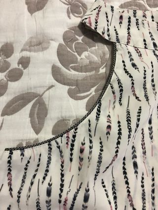 Top donna fantasia piume