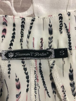 Top donna fantasia piume