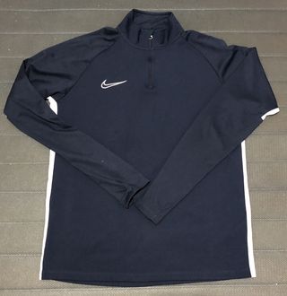 Camiseta deportiva Nike azul y blanca