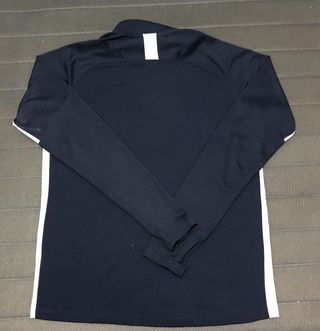 Camiseta deportiva Nike azul y blanca
