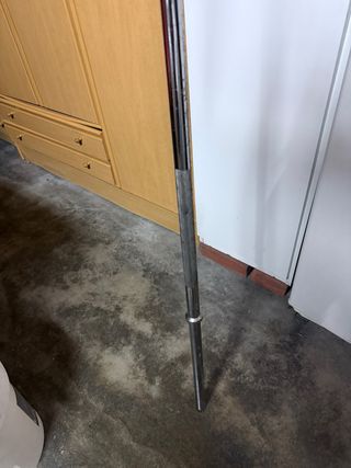 Barra y discos de pesas para fitness