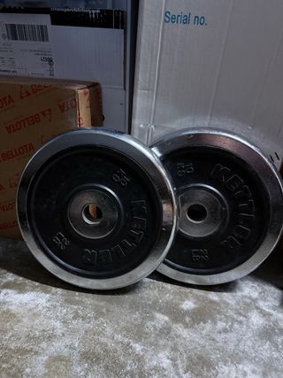 Barra y discos de pesas para fitness