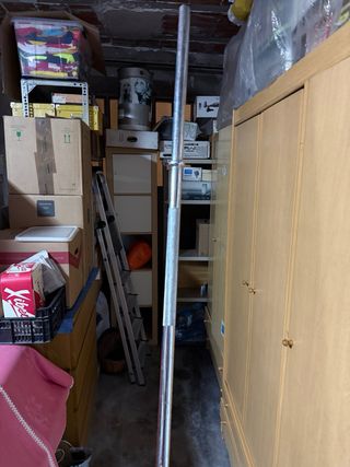 Barra y discos de pesas para fitness