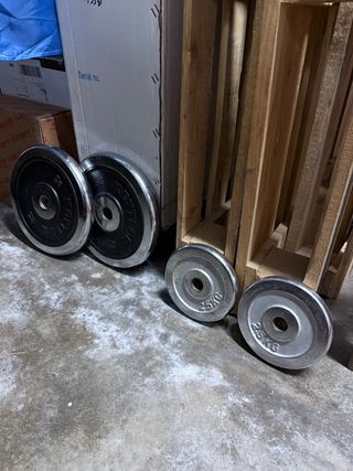 Barra y discos de pesas para fitness