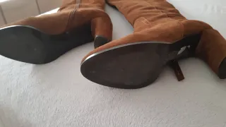 Botas altas ante Gloria Ortiz marrones