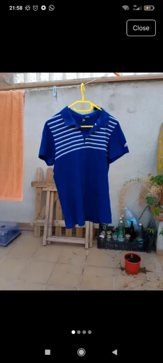 Polo Adidas azul rayas blancas Talla M