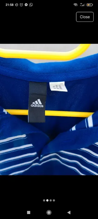 Polo Adidas azul rayas blancas Talla M