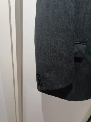 Traje de dos piezas . Una puesta