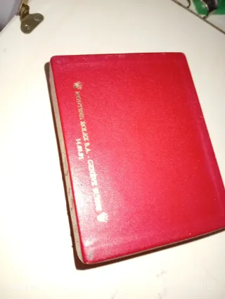 Caja de reloj Junghans negra y dorada y de Rolex.