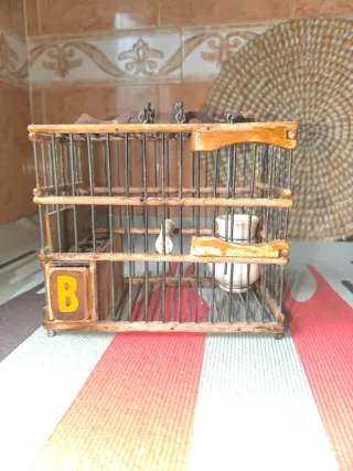 Jaula percha para pájaros silvestres