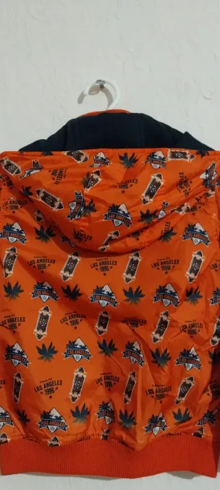 Chaqueta bomber Orchestra naranja estampada