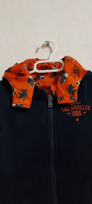 Chaqueta bomber Orchestra naranja estampada