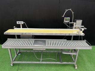 Cinta transportadora con báscula y cinta de rodill