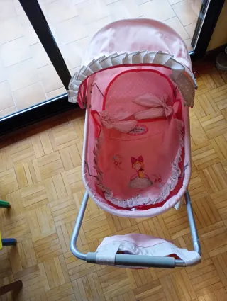 Cochecito de muñecas rosa