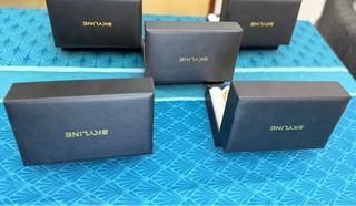 Pulseras Skyline Negras y Doradas