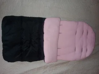 Saco de bebé rosa y negro nuevo sin estrenar