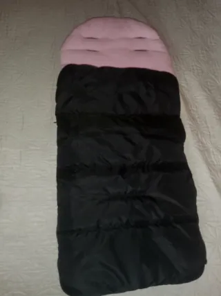 Saco de bebé rosa y negro nuevo sin estrenar