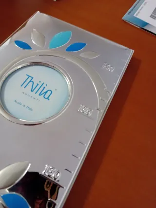 Metro nascita Thilia albero della vita porta foto