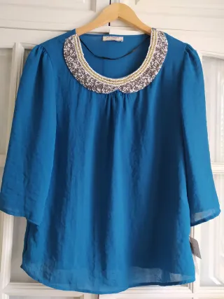 Blusa, cuello bebe con Pedrería t. L
